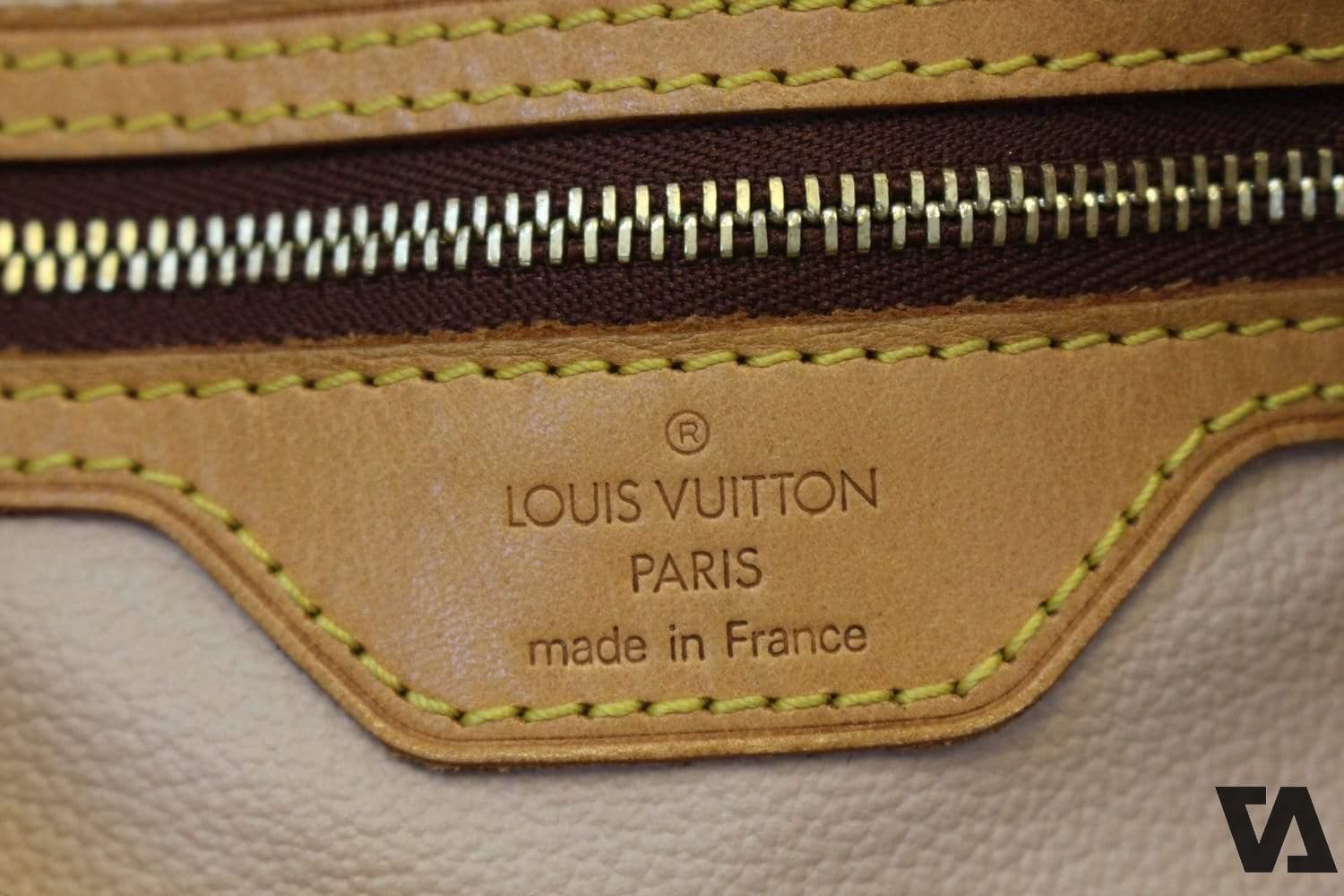 Cách nhận biết ví cầm tay nam Louis Vuitton chính hãng